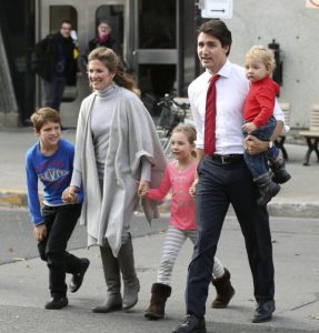 Liberal leader Justin Trudeau arrives at the polling station with his wife Sophie, sons Hadrien (R), Xavier (L) and daughter Ella-Grace (C) in Montreal, Quebec, October 19, 2015. Canadians go to the polls in a federal election on Monday. REUTERS/Chris Wattie